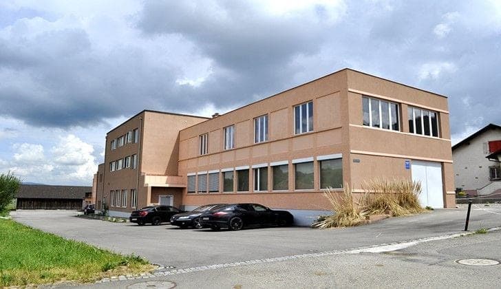 Jura - Magnifique immeuble commercial et résidentiel entièrement rénové — Courfaivre